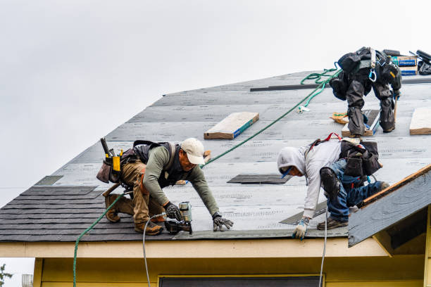 Professional Roofing technician working in White Oak, NC